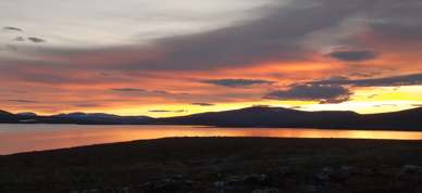 Landskap I Solnedgang Tatt Av H Helland